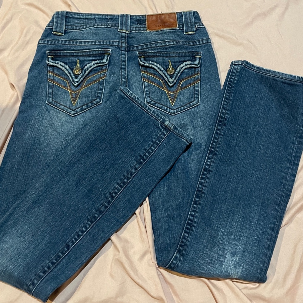 These are low waisted flares with brown stitching